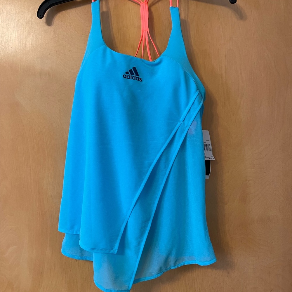 Adidas tennis strappy tank top. Build in bra. Never worn